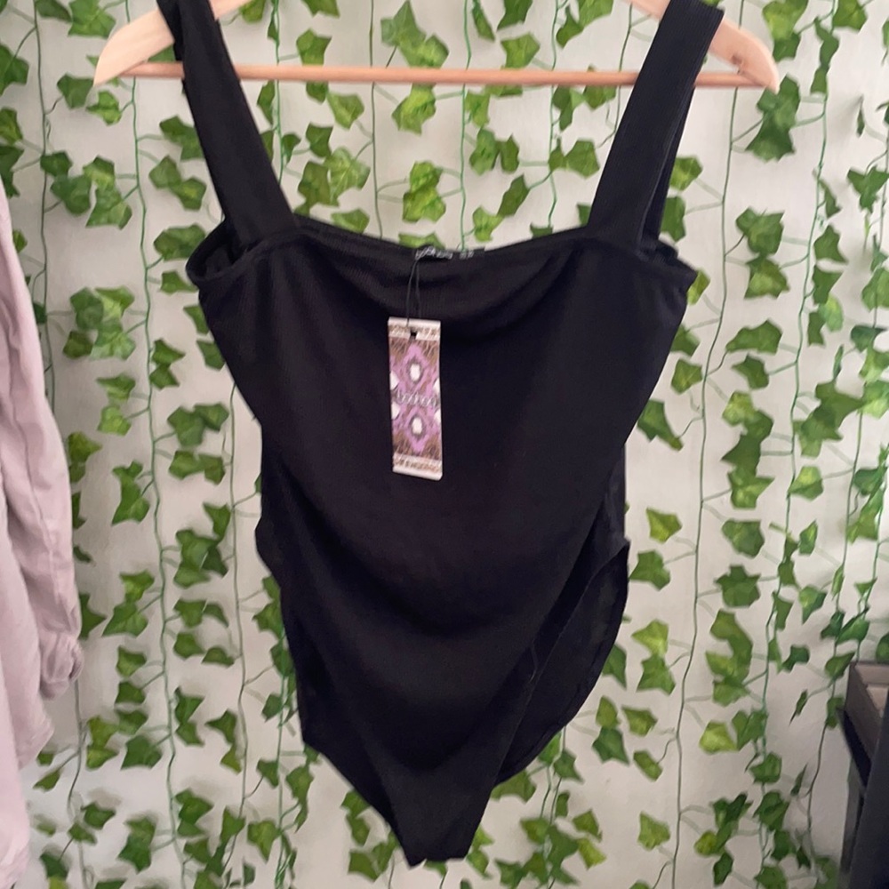 Black ribbed body suit